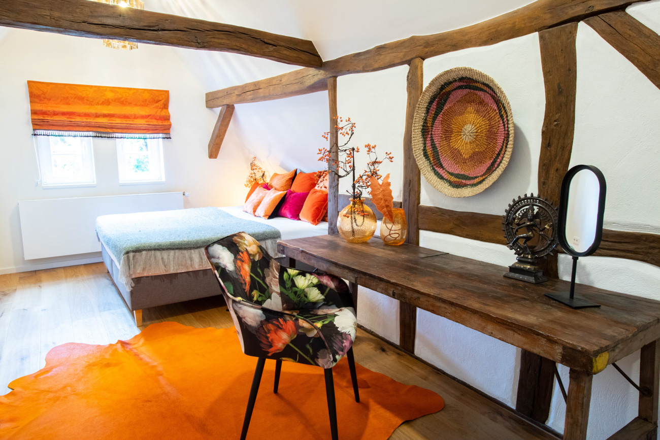 Schlafzimmer orange (Obergeschoss)
